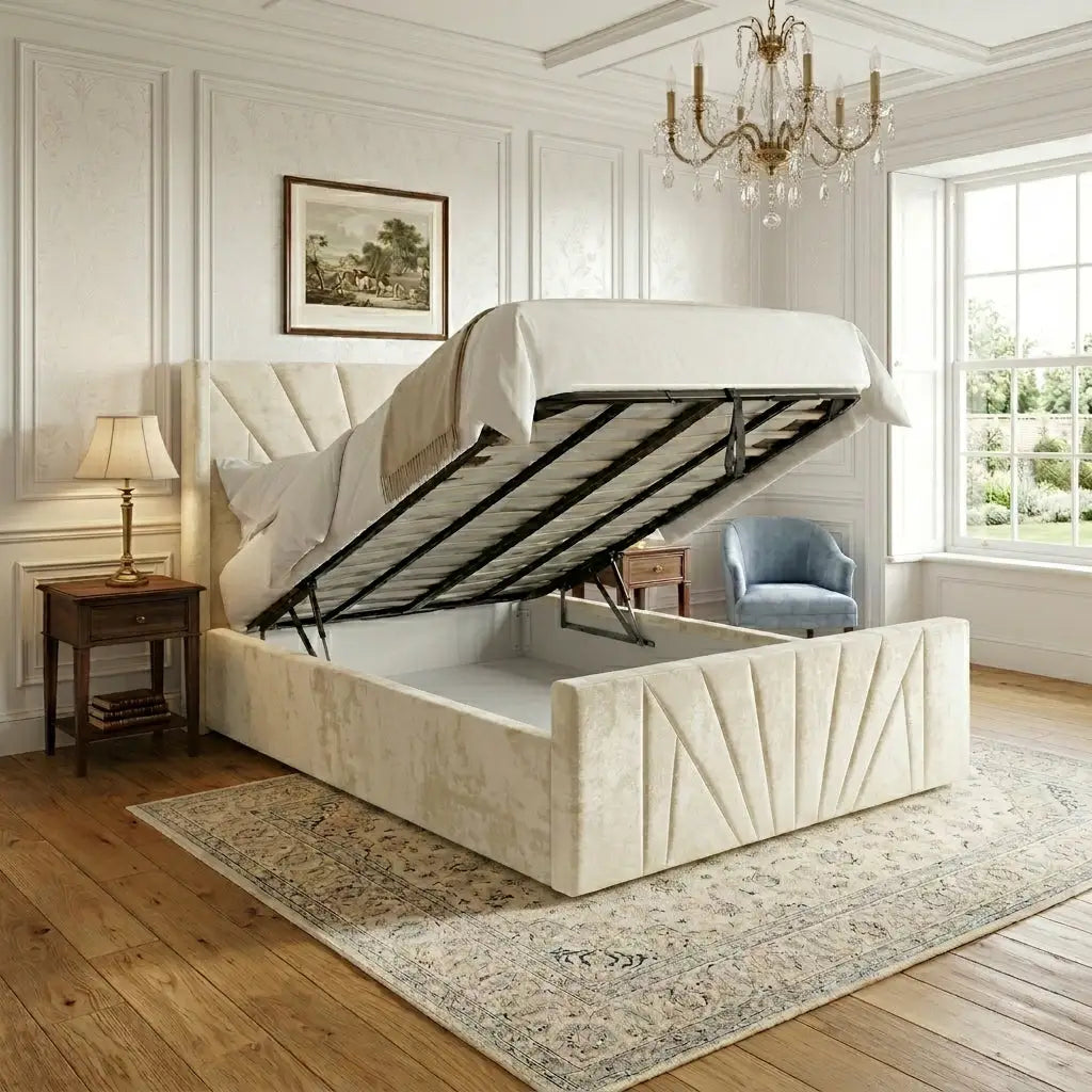 An upholstered Ascot Wingback lift-up storage bed in a bright bedroom shown with the mattress raised to reveal the storage compartment underneath.  