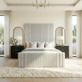 Elara luxury panel bed with matching footboard and tall upholstered headboard in modern bedroom setup