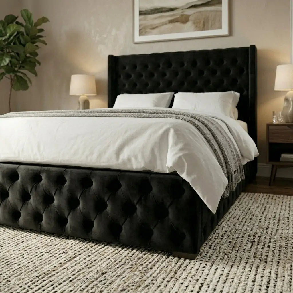 Marlborough Deep Button bed frame with an upholstered headboard and matching footboard, styled with white bedding and a gray throw blanket in a bedroom setting.