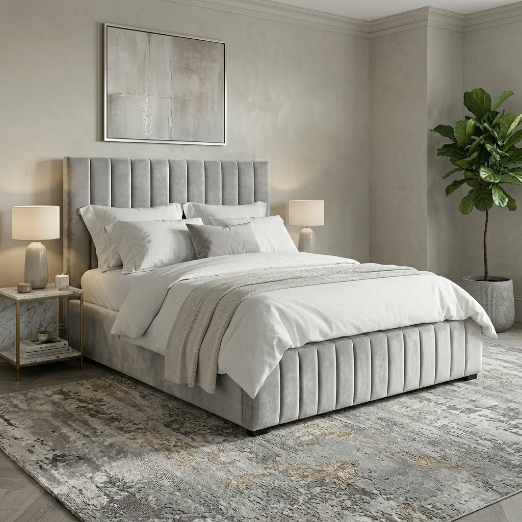 Notting Hill bed with a tall channel-tufted headboard and matching footboard, dressed in white bedding and set in a styled bedroom  