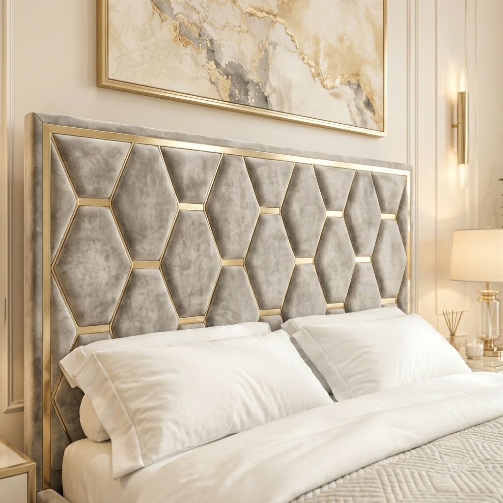 Close up of 3D geometric hexagonal quilted pattern on grey bed headboard
