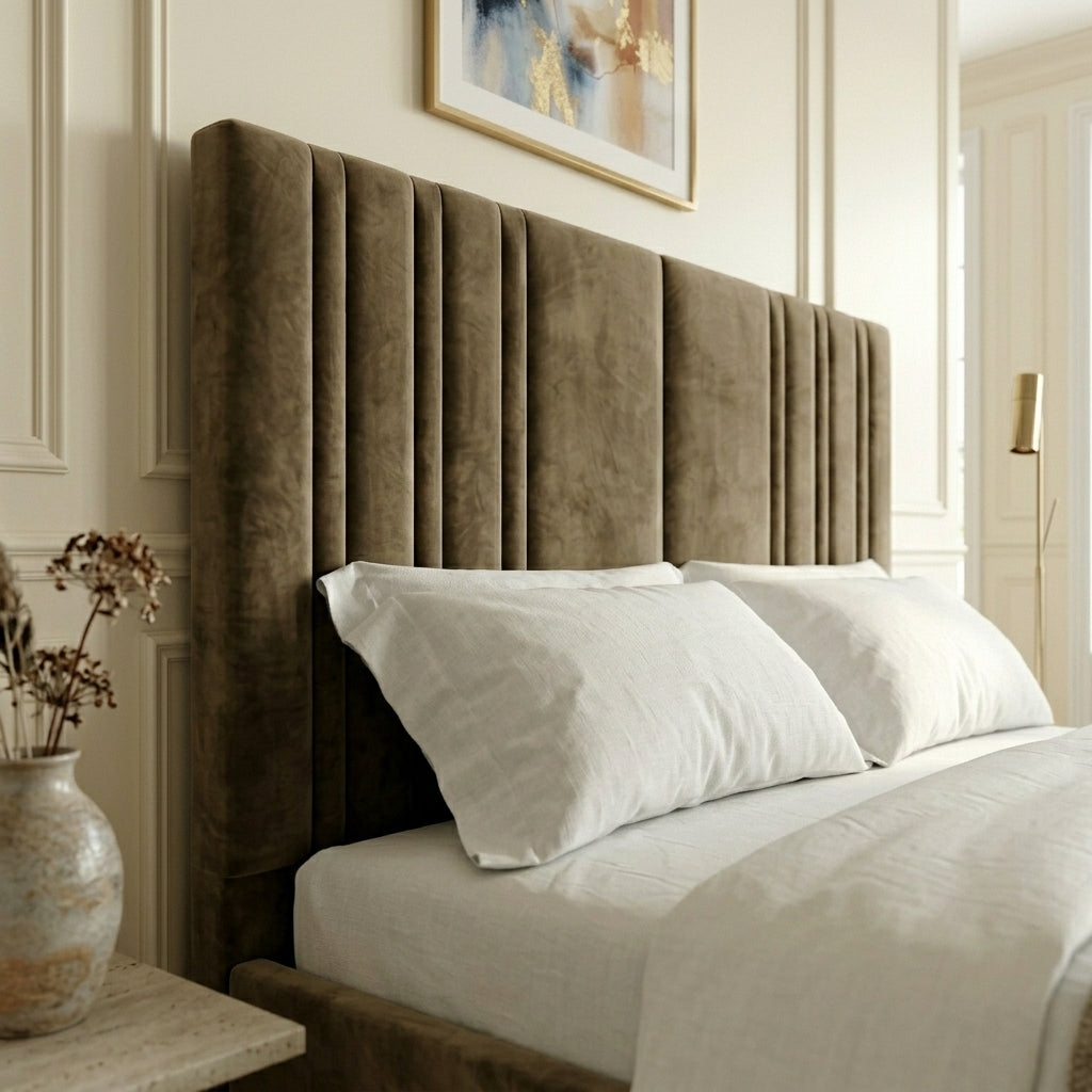 Close up of extra tall upholstered wingback headboard in matte mink fabric
